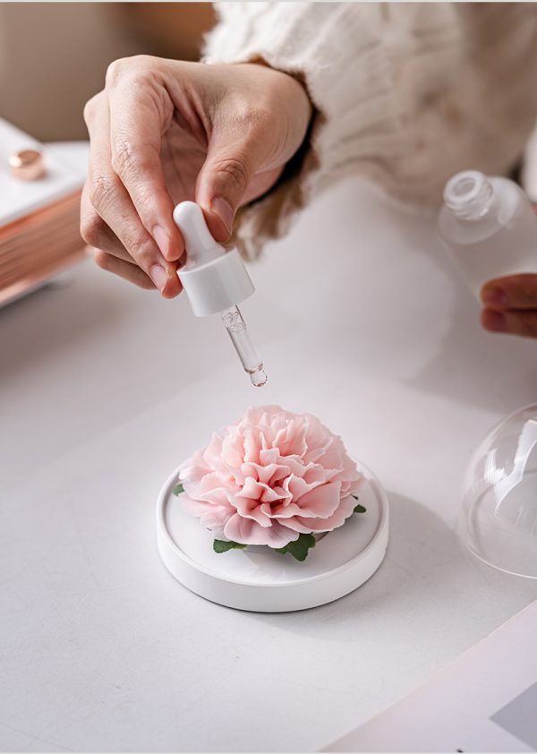 AromaMandala carnation porcelain diffuser, hand-sculpted Dehua blanc de chine, non-fire aromatherapy flower ornament, AntChain verified provenance